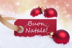 23005229-A-Red-Label-With-the-Italian-Words-Buon-Natale-Which-Means-Merry-Christmas-on-It-Stock-Photo